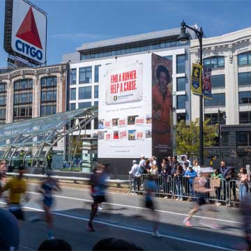 Runners pass OAAA Local Media Plan Grand Prize-winning Bank of America OOH campaign at Boston Marathon