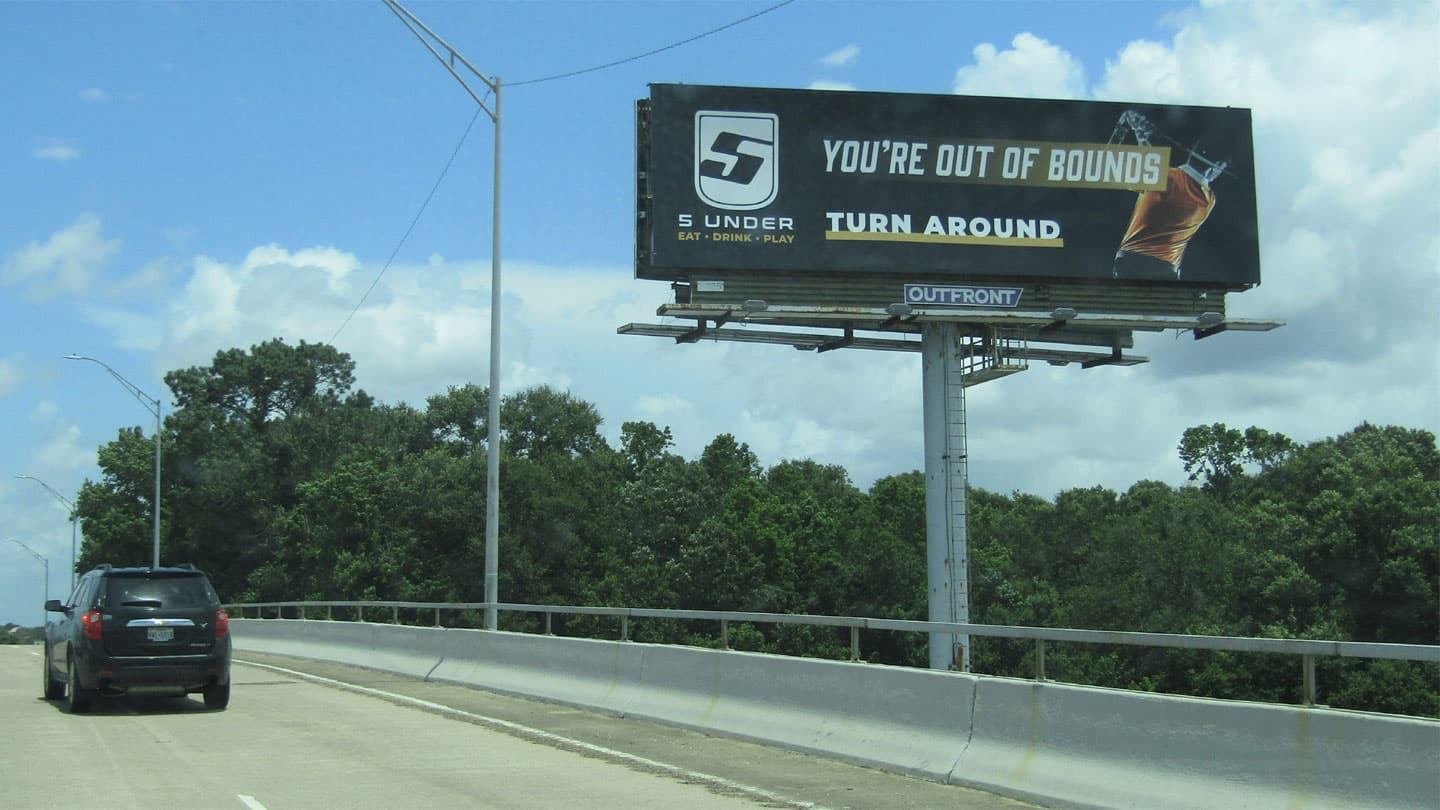 highway billboard out of home advertising in beaumont texas for five under golf