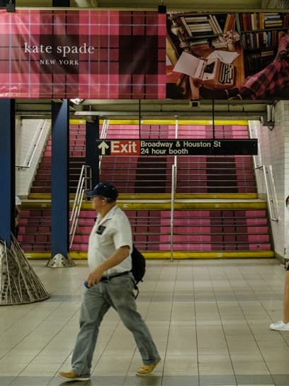 out of home subway transit advertising kate spade